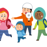 災害時に避難する人